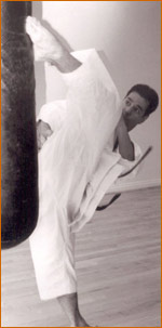 Sensei Tanzadeh performing Ura-mawashi geri